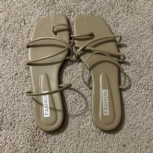 Tan sandals. Never worn. Size 42